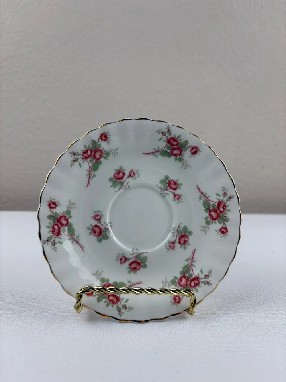 Royal Albert Bone China Teacup and Saucer Featuring the Rose Time Pattern